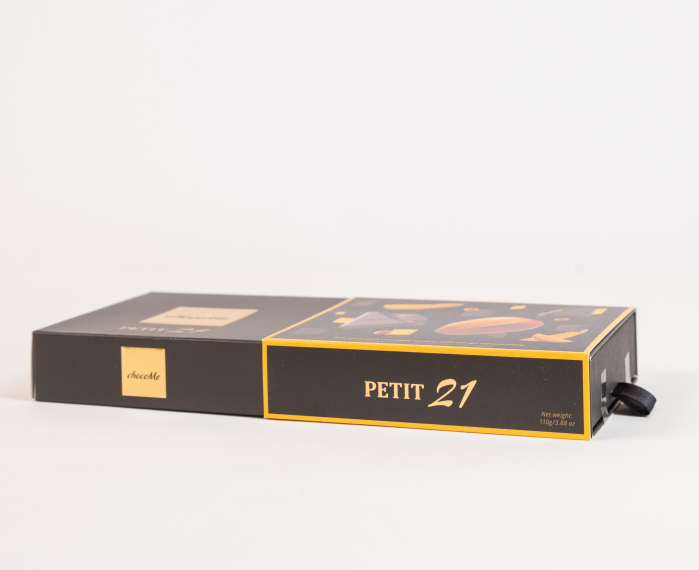 Petit 21 (cubulete de cioc. neagra umplute cu mango) 110g [3]