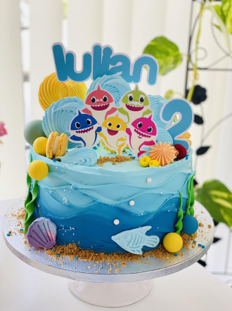 Baby Shark - Topper de tort cu element special din carton sub forma de cap de familia Baby Shark