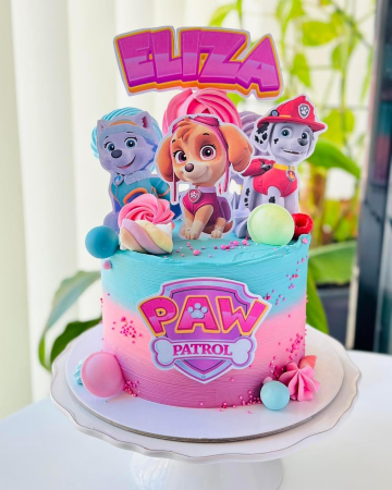 Topper de tort cu element special din carton sub forma de cap de logo Paw Patrol roz cu fucsia