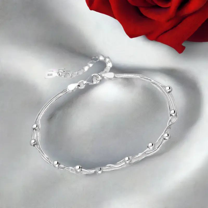 BIJUTERII SI CEASURI - Bratara din argint sterling 925 cu 3 lantisoare si bilute