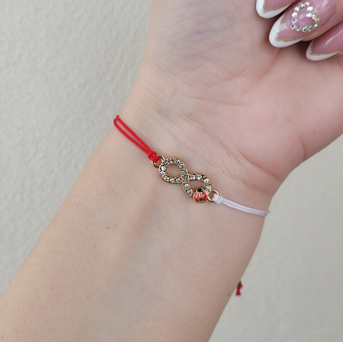 Bratara Martisor infinit auriu cu buburuza si cristale, cu snur ajustabil [4]