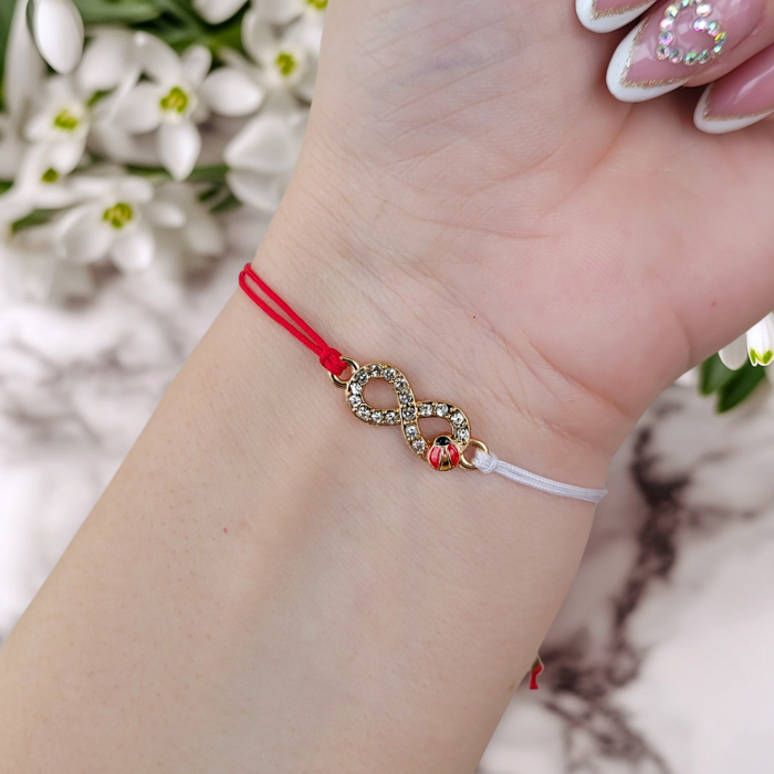 Bratara Martisor infinit auriu cu buburuza si cristale, cu snur ajustabil [3]