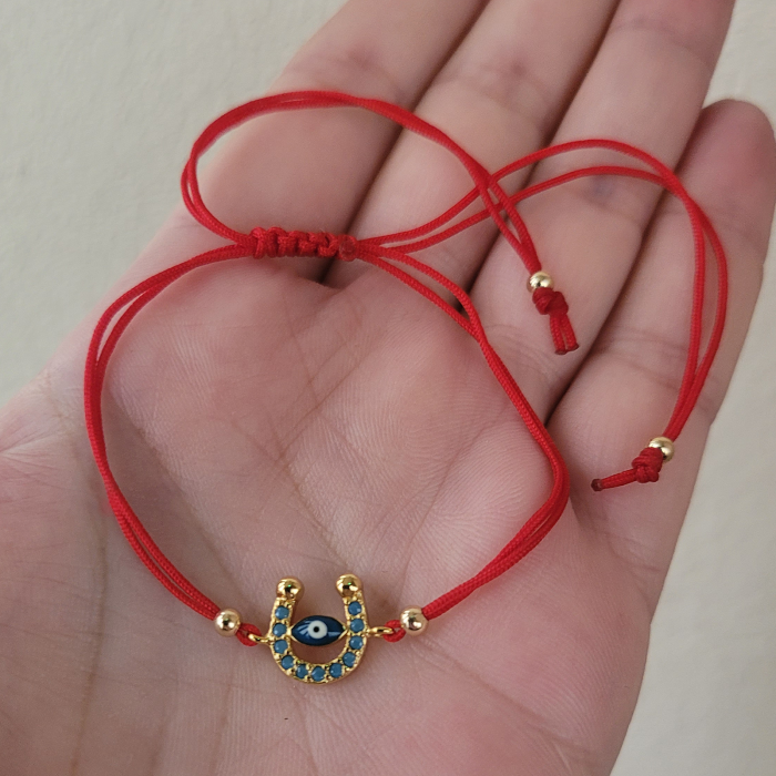 Bratara Martisor potcoava cu ochi protector, placata cu aur, decorata cu cristale Cubic Zirconia, culoare turcoaz, cu snur ajustabil [4]
