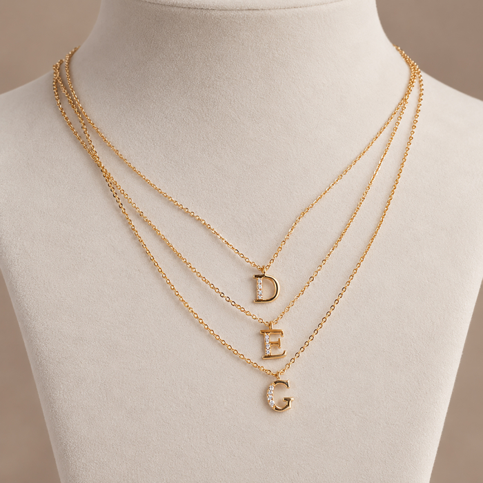 Colier placat cu aur, cu pandant initiala decorata cu cristale Cubic Zirconia [7]