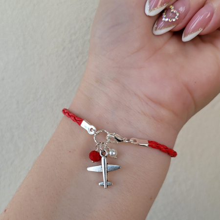 Martisoare - Bratara martisor cu snur impletit rosu, charm avion si perlute