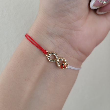 Martisoare - Bratara Martisor infinit auriu cu buburuza si cristale, cu snur ajustabil