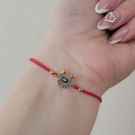 Martisoare - Bratara Martisor potcoava cu ochi protector, placata cu aur, decorata cu cristale Cubic Zirconia, culoare turcoaz, cu snur ajustabil
