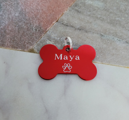 Dog tag personalizat in forma de os, cu nume si simbol, gravate pe os din aluminiu [1]