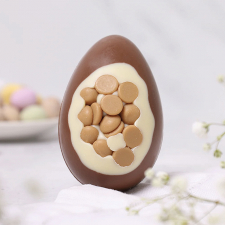 Specialitati ciocolata - Ou de ciocolata cu lapte si nasturei de caramel 50G