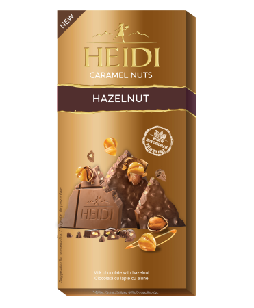 Ciocolata & Praline - HEIDI Milk & Hazelnut este o tabletă de ciocolată cu lapte fină, îmbogățită cu bucăți crocante de alune de pădure caramelizate și o pastă delicată de alune, oferind o combinație echilibrată între dulceață, textură și intensitate