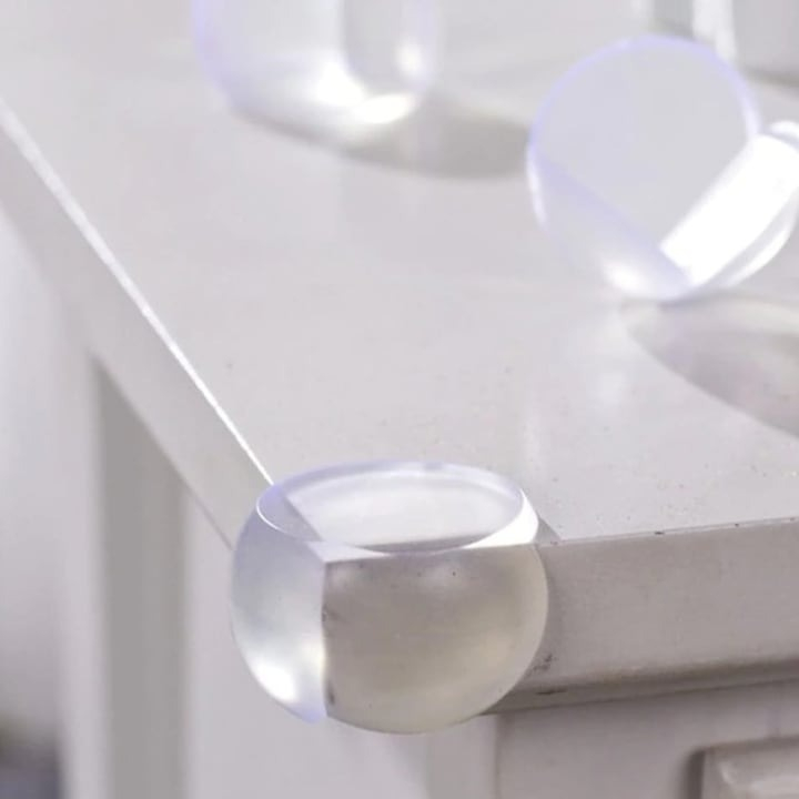 Set 4 bucati protectie colturi, universale, pentru siguranta copiilor, din silicon, rotunde, pentru mese, paturi, dulapuri, transparent [7]