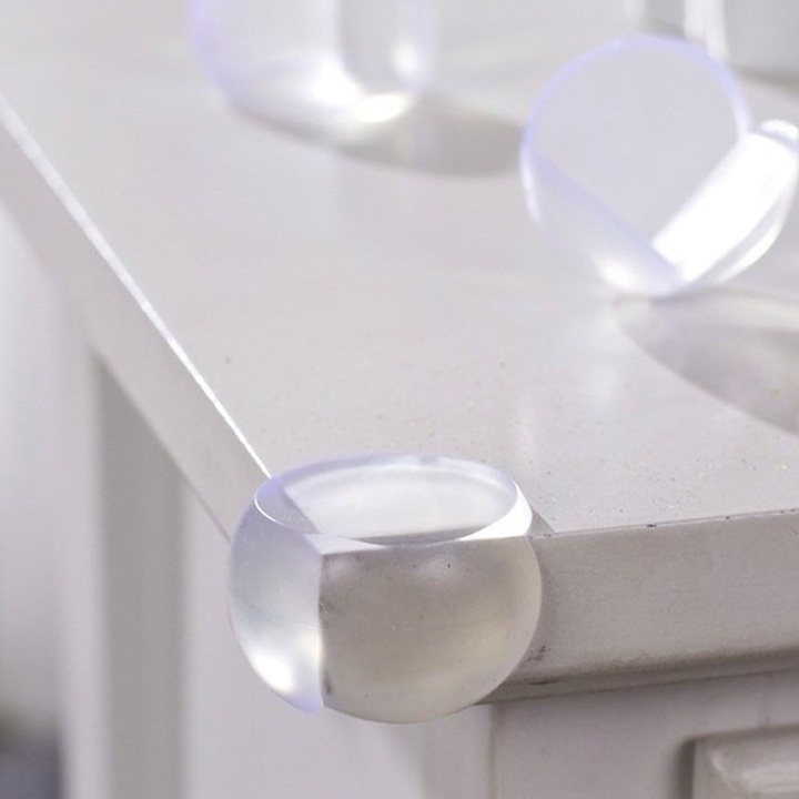 Set 8 protectii pentru colturi mobilier, rotunde, silicon moale, adeziv inclus, pentru siguranta copiilor, transparent [7]