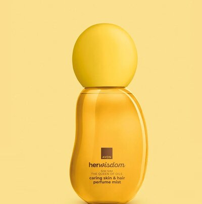 Set cadou auriu Avon HerWisdom Sim Sim, spray parfumat piele si par 100 ml, floarea Nilului, nuci de caju, cuier transparent 5.6 x 5.6 cm autoadeziv [9]