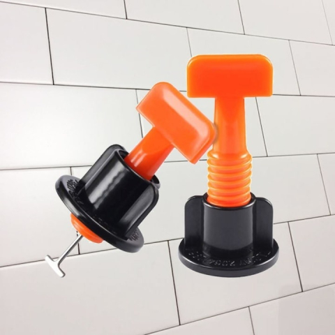 Set sistem pentru spatiat si nivelat gresia, 100 distantiere reutilizabile, 50 stele si 2 chei de strangere, pentru placi ceramice 2–16 mm, rost 1.5–5 mm, utilizare interior/exterior [1]