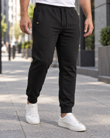 Pantaloni barbati - Pantaloni trening barbati marimi mari, negri, cu manseta, talie elastica si buzunare cu fermoar