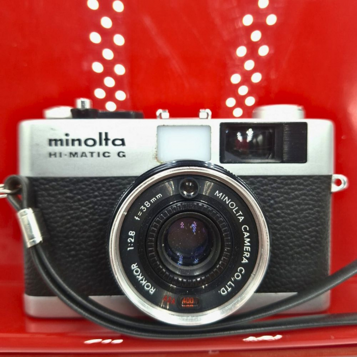 Minolta Hi-Matic G – Cameră analog 35mm cu expunere automată și obiectiv Rokkor 38mm f/2.8, fabricată în Japonia [1]