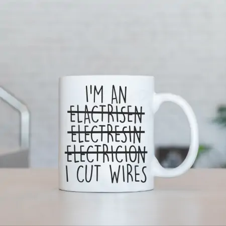 Cadouri pentru Colegi - Cana alba "I'm an electrician, I cut wires"