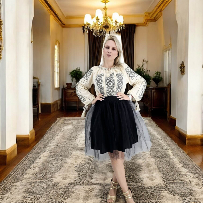 Ie traditionala Carmenta [6]