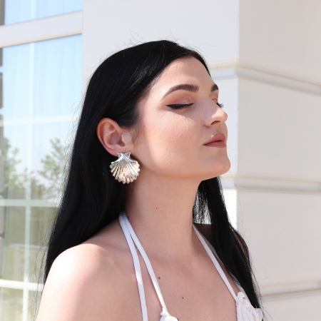 Cercei din argint în forma de scoica. [1]