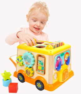 Cuburi din lemn (18 Luni +) - Autobuz din lemn cu centru de activitatii  si sunete