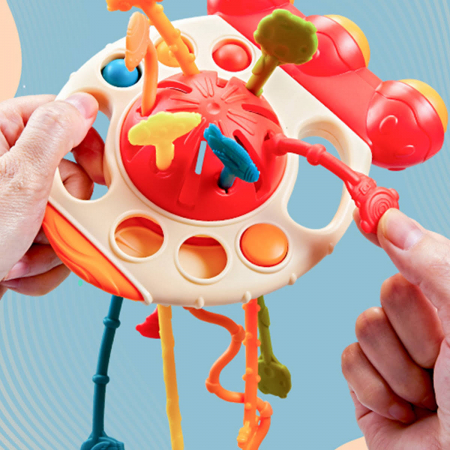 Jucarie senzoriala din Silicon Montessori Bebelusi Dentitie Motricitate cu Activitatii Racheta [1]