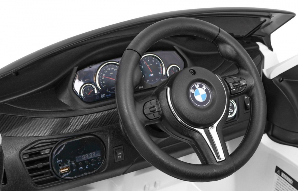 BMW X6M alb, o masinuta electrica destinata copiilor intre 2 si 6 ani [13]