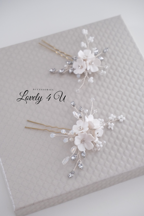 accesorii delicate păr, bijuterii păr placate cu argint, accesorii rafinate mireasă, accesorii nuntă handmade, accesorii păr sofisticate, accesorii premium nuntă, bijuterii deosebite mireasă, accesorii versatile păr mireasă. [9]