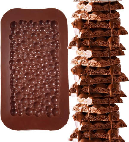 Creează deserturi fine cu forma din silicon alimentar pentru ciocolată Dubai cu umplutură de cataif. Dimensiuni 25x13 cm, material antiaderent și flexibil, ideală pentru praline, bomboane și ciocolată artizanală. Reutilizabilă, ușor de curățat și fără BPA. [1]