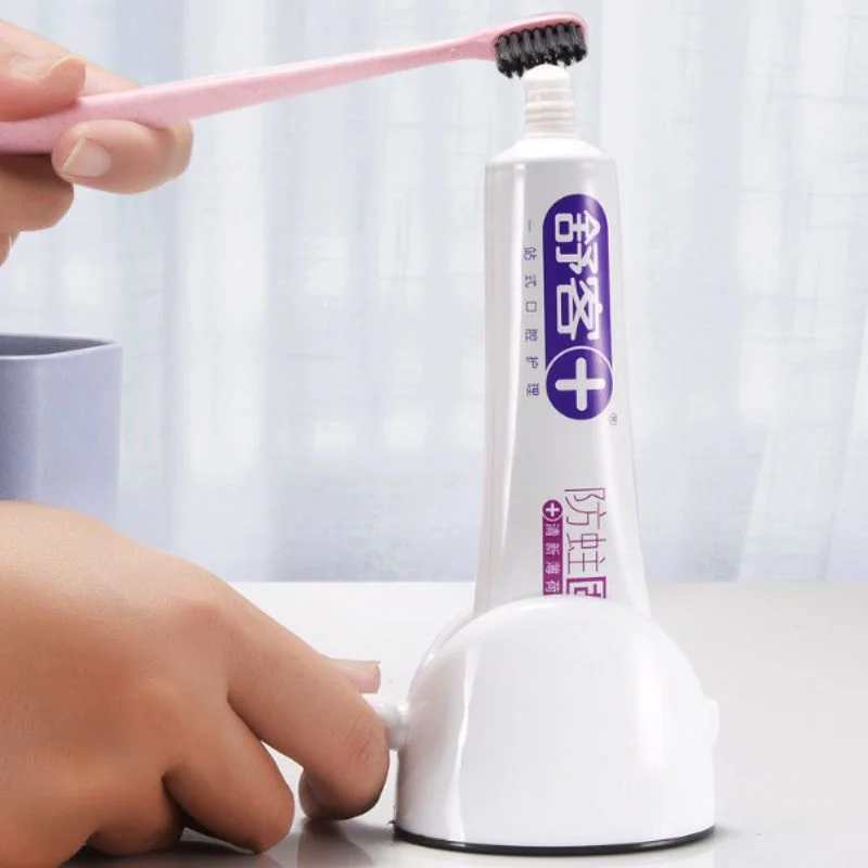 Gadget - Dispozitiv rotativ pentru pasta de dinti