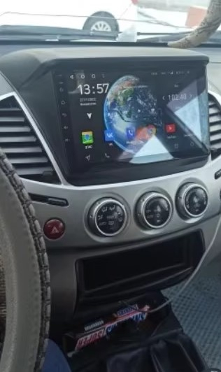Navigatie Mitsubishi L200 din 2008 - 2016,  Android 14 , 4GB RAM, Octacore, Slot Sim 4G, DSP, GPS, Wi-FI, Carplay, Android Auto, USB, Bluetooth, Waze, Touchscreen, 9 inch [10]