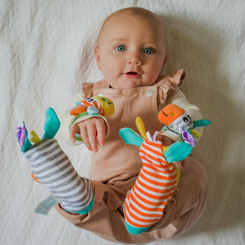 Set jucarii zornaitoare, Playgro, Include sosete interactive si 2 bratari, Inchidere cu velcro, Stimuleaza dezvoltarea senzoriala si tactila, 6 luni+, Jungle Wrist Rattle and Foot Finder [9]
