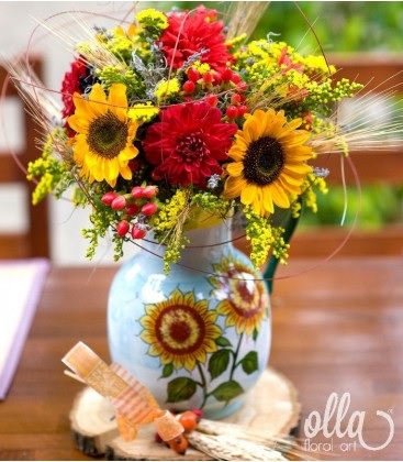 buchet de flori cu floarea soarelui in vaza