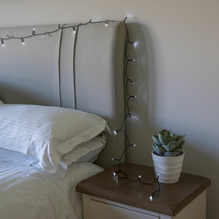 Instalatie de Craciun liniara Yoto, 10 m, din care 1 m cablu priza 220V, 100 LED, 8 jocuri de lumini, controler, fir negru, alb rece [9]