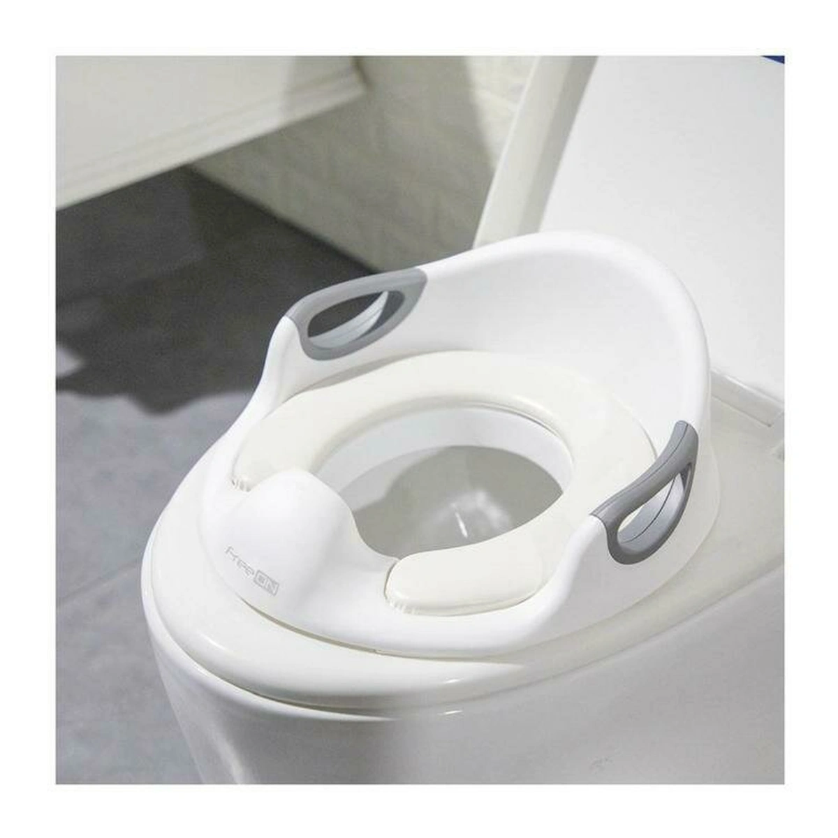 Reductor toaleta, FreeON, Cu perna confortabila si detasabila, Cu manere, 37x9,3x65,5 cm, White 24 luni+ [1]