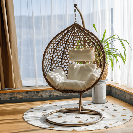 Toate Produsele - Balansoar tip cuib cu structură stabilă și perne moi, ideal pentru relaxare în living, balcon sau terasă. Design modern, confort maxim și stil natural.