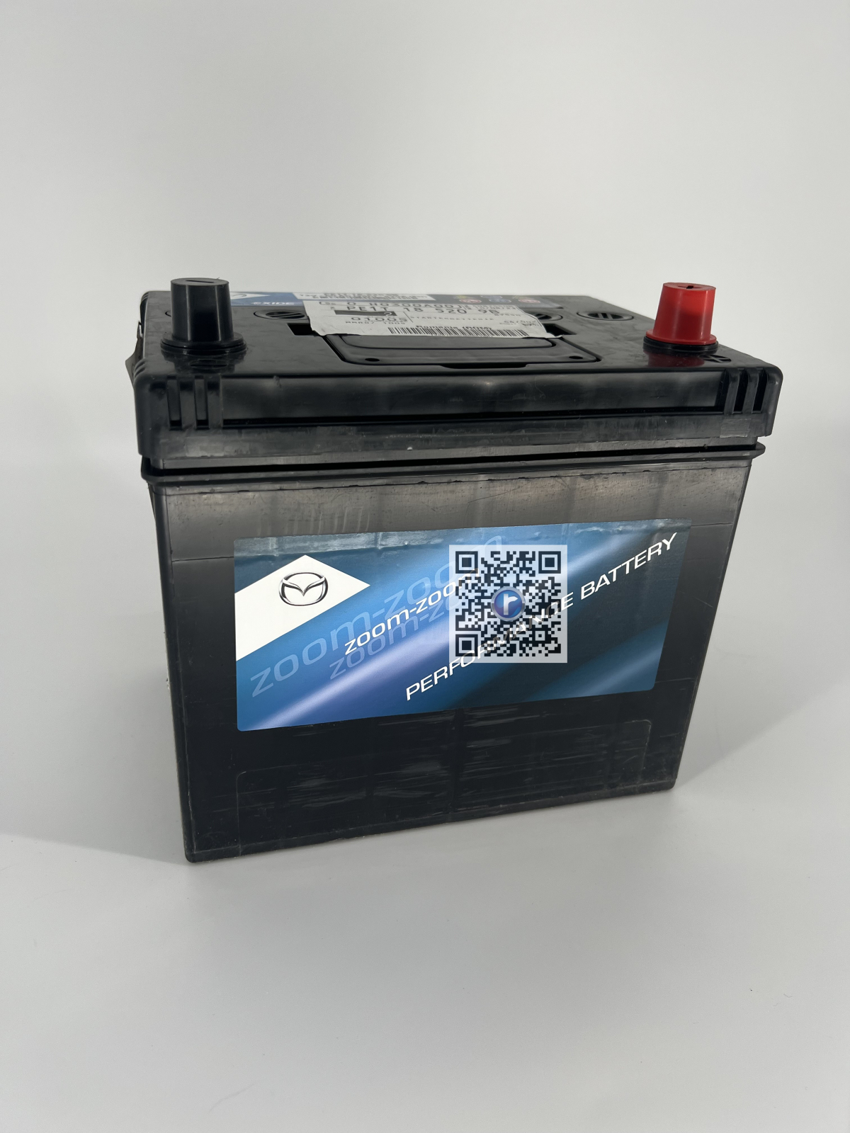 Багажник с автозапчастями - АКУМУЛЯТОР 12V / 60AH - PE1T18520 9B