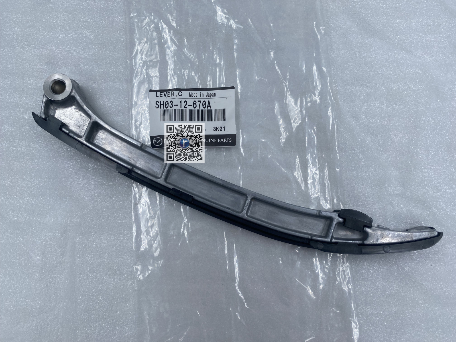 Coffre avec pieces de voiture - GLISSIÈRE DE TENDEUR DE CHAÎNE DE DISTRIBUTION - Mazda SH0312670A