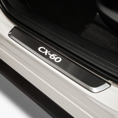 Trunk with car parts - ILLUMINATED DOOR SILLS - Mazda CX-60 KMDCV1370