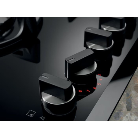 Plită incorporabilă Electrolux KGG643753K, Gaz pe Sticlă, 4 Arzătoare, WOK, 60 cm, Negru Plita incorporabilă Electrolux KGG643753K combină eleganța suprafeței din sticlă neagră cu performanța celor 4 [1]