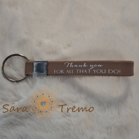 Brelocuri personalizate - Breloc cu curelușă din silicon – prindere metalică și mesaj în limba engleză