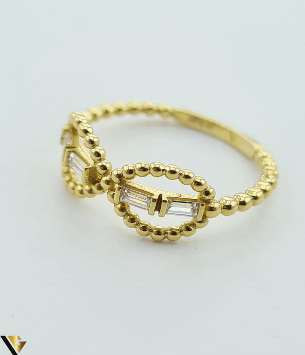 Inel din aur 14k, 585 2.09 grame Latime inelului la partea superioara este de 7 mm Diametrul inelului este de 18mm Masura standard RO: 62 si UE: 22 Marcaj cu titlul "585" Locatie Harlau [4]