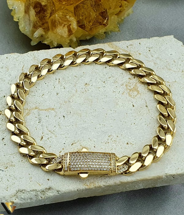 Bratara aur 14K, Cristale de zirconiu Greutate: 17.43 gr Lungime: 22 cm Latime: 10 mm Marcaj / titlu "585" Locatie: Bacau Calea Marasesti Tel:0756943079 [1]