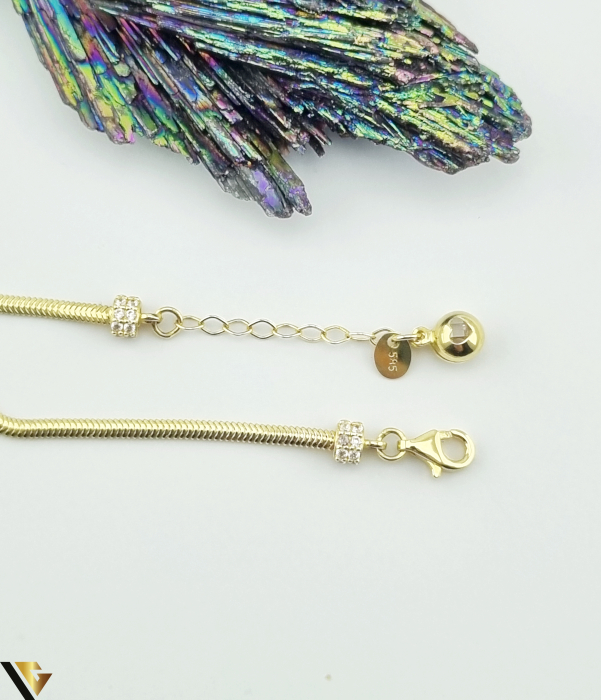 Bratara aur 14k, opal de sinteza si cubic zirconia Greutate: 3.96 grame Latime: 2.15 mm  Dimensiune opal de sinteza: 8 mm / 6 mm Lungime: 20.5 cm (posibilitate prindere de la 17 cm)  Marcaj / titlu: " 585 " [2]