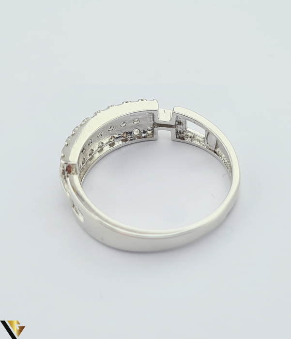 Inel din argint, 925 2.02 grame Latime inel 5mm Diametrul inelului este de 16.5mm (masura standard RO:52 si UE: 12) Cristale de zirconiu Marcaj cu titlul "925" Locatie HARLAU [3]