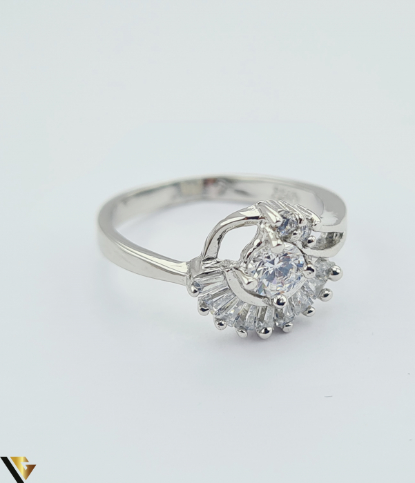 Inel din argint, 925 2.24 grame Latime inel 10 mm Diametrul inelului este de 16.5mm (masura standard RO:52 si UE: 12) Cristale de zirconiu Marcaj cu titlul "925" Locatie HARLAU [2]