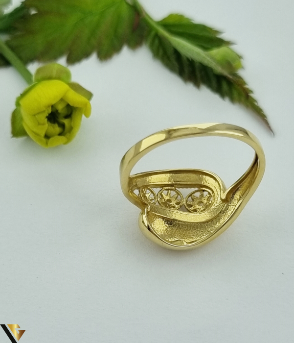 Inel  aur 14k Greutate: 2.79 grame Latime maxima superioara 14mm Diametrul inelului este de 17.50 mm Masura UE: 15 si RO: 55 (circumferinta) Marcaj / titlul "585" Locatie: Harlau  0723 353 111 [3]