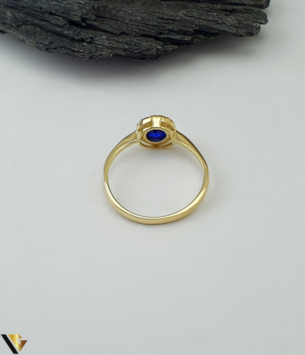 Inel aur 14k Spinel de sinteza, Cristale de zirconiu Greutate: 1.43 grame Latime: 8 mm Diametru: 17 mm Masura: UE 13 / RO 53 (circumferinta) Marcaj /  titlu: "585" Locatie: Bacau Calea Marasesti Tel: 0756943079 [2]