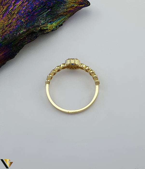 Inel aur 14k Spinel de sinteza si Cristale de zirconiu Greutate: 1.44 grame Latime: 7 mm Diametru: 17.75 mm Masura: UE 16 / RO 56 (circumferinta) Marcaj /  titlu: "585" Locatie: Bacau Calea Marasesti Tel: 0756943079 [2]