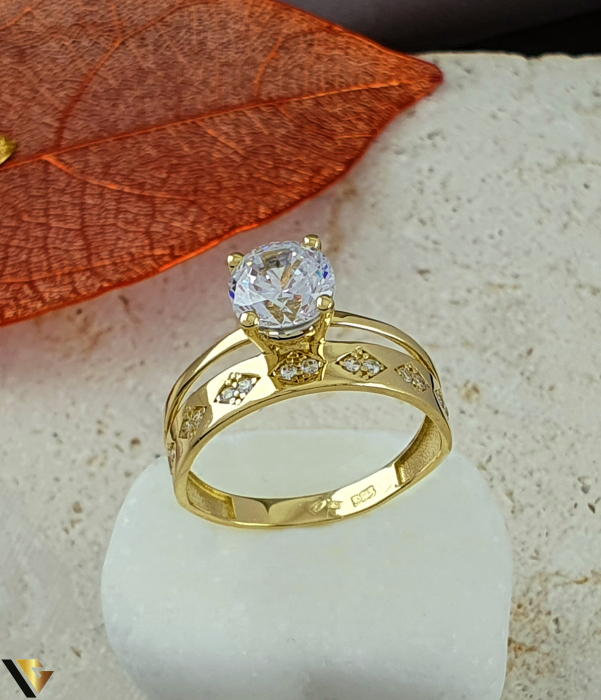 Inel aur 14k, Cristale de zirconiu Greutate: 3.54 grame Latime: 10 mm Diametru: 19,20 mm Masura: UE 19 / RO 59 (circumferinta) Marcaj /  titlu: "585" Locatie: Bacau Calea Marasesti Tel: 0756943079 [1]
