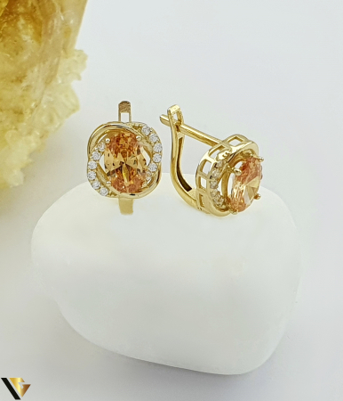 Cercei din aur - Cercei aur 14k, Cristale de zirconiu Greutate: 2.62 grame Lungime: 12 mm Latime: 10 mm Marcaj / titlu: 585 Locatie: Bacau Calea Marasesti Tel: 0756943079